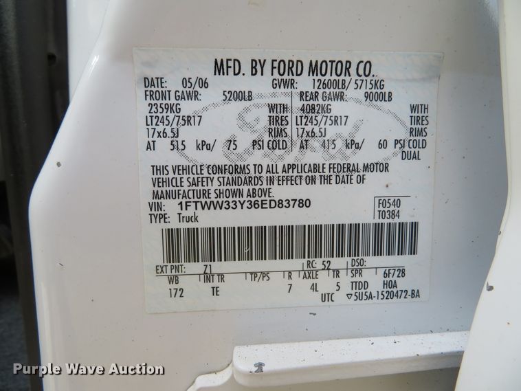 image for item DH1703 2006 Ford F350 Super Duty XL Crew Cab flatbed pickup truck