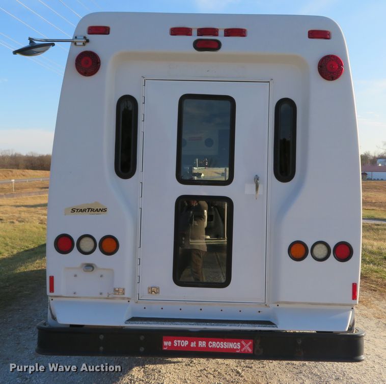 image for item DH1748 2009 Ford E350 Super Duty shuttle bus