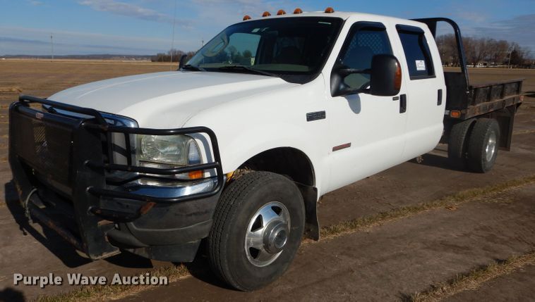 image for item DH4294 2004 Ford F350 Super Duty Crew Cab utility bed pickup truck