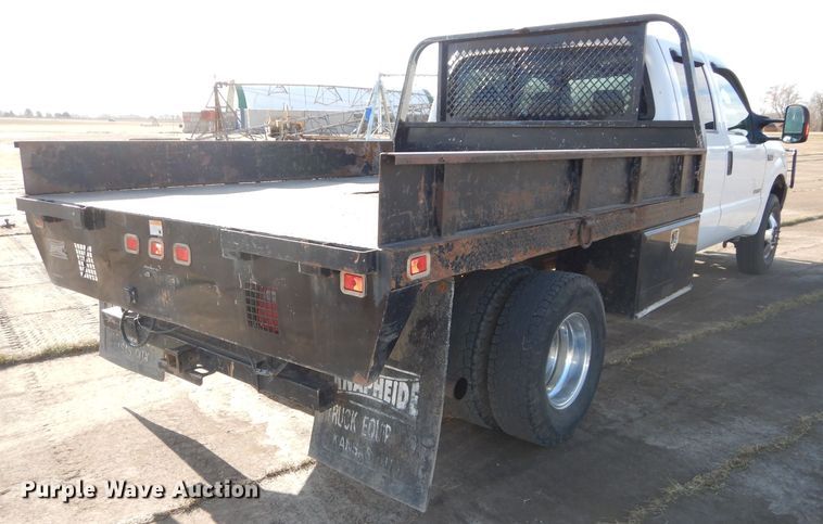 image for item DH4294 2004 Ford F350 Super Duty Crew Cab utility bed pickup truck