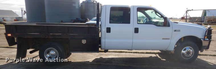 image for item DH4294 2004 Ford F350 Super Duty Crew Cab utility bed pickup truck