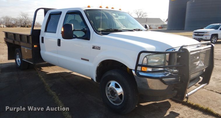 image for item DH4294 2004 Ford F350 Super Duty Crew Cab utility bed pickup truck