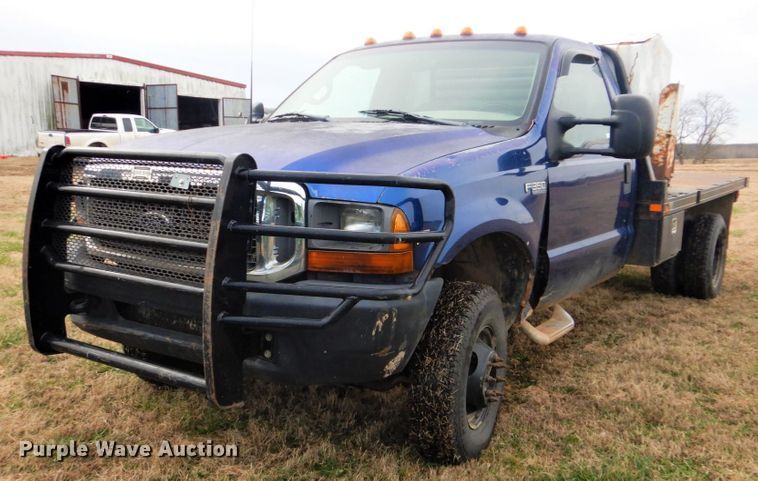 image for item FF9183 1999 Ford F350 Super Duty bale bed pickup truck