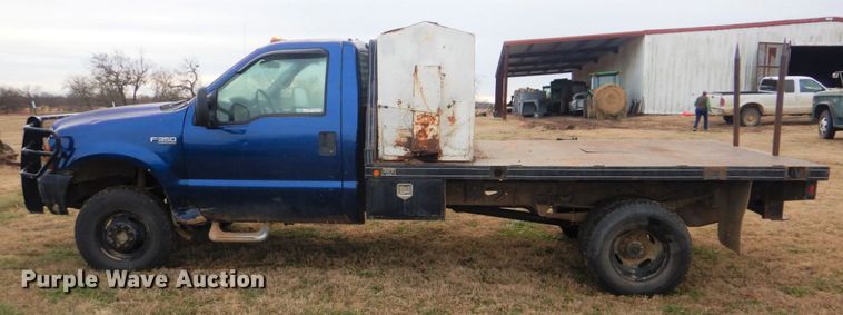 image for item FF9183 1999 Ford F350 Super Duty bale bed pickup truck