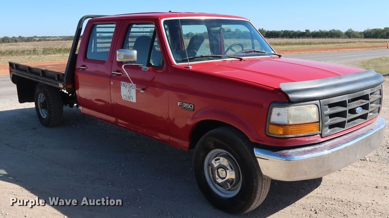 image for item GD9777 1996 Ford F350 XL Crew Cab flatbed pickup truck