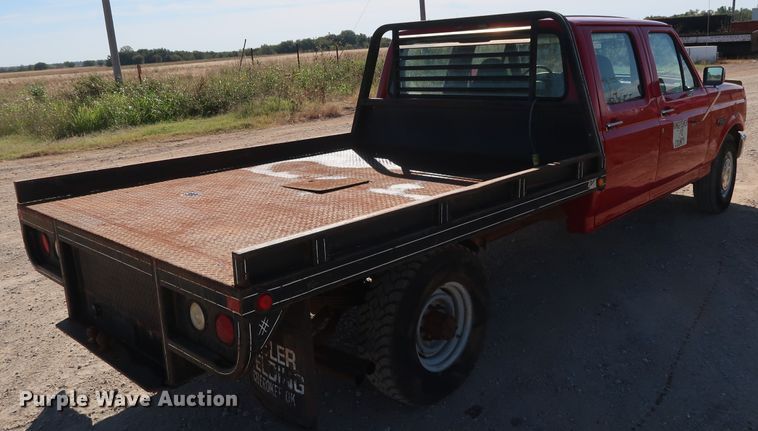 image for item GD9777 1996 Ford F350 XL Crew Cab flatbed pickup truck