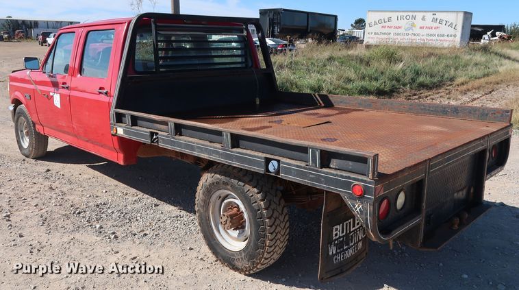 image for item GD9777 1996 Ford F350 XL Crew Cab flatbed pickup truck