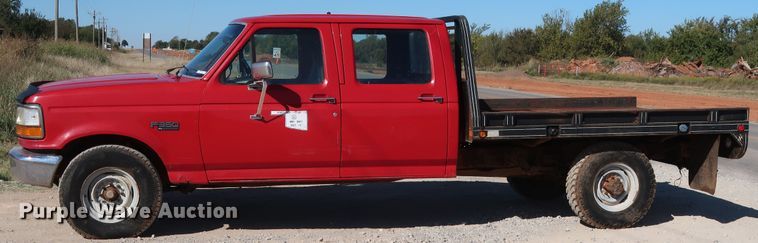 image for item GD9777 1996 Ford F350 XL Crew Cab flatbed pickup truck