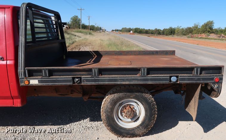image for item GD9777 1996 Ford F350 XL Crew Cab flatbed pickup truck