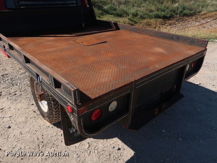 image for item GD9777 1996 Ford F350 XL Crew Cab flatbed pickup truck