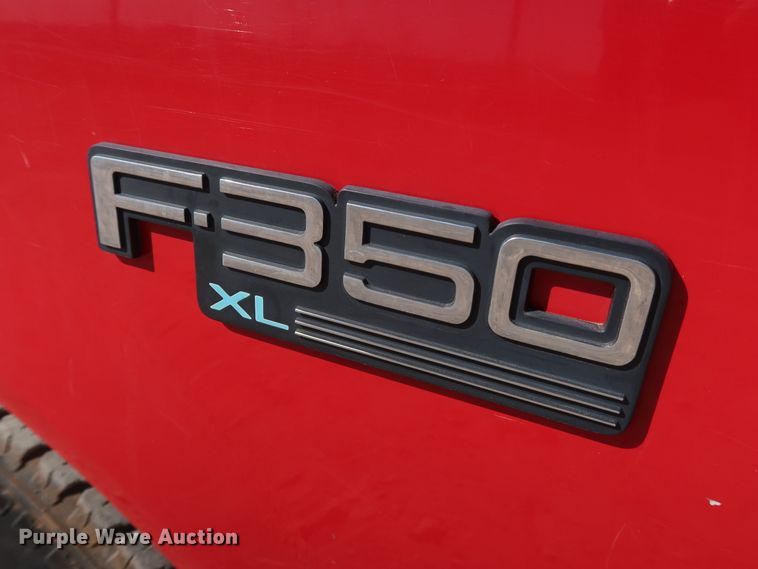 image for item GD9777 1996 Ford F350 XL Crew Cab flatbed pickup truck