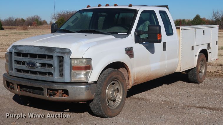 image for item GD9895 2010 Ford F350 Super Duty SuperCab utility bed pickup truck