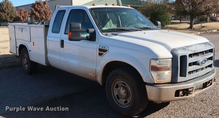 image for item GD9895 2010 Ford F350 Super Duty SuperCab utility bed pickup truck