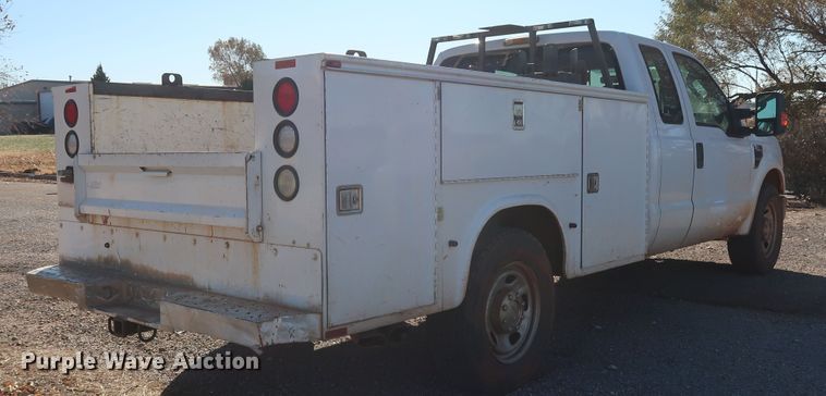 image for item GD9895 2010 Ford F350 Super Duty SuperCab utility bed pickup truck