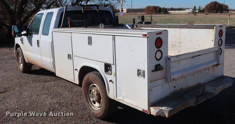 image for item GD9895 2010 Ford F350 Super Duty SuperCab utility bed pickup truck