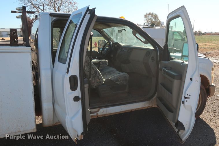 image for item GD9895 2010 Ford F350 Super Duty SuperCab utility bed pickup truck