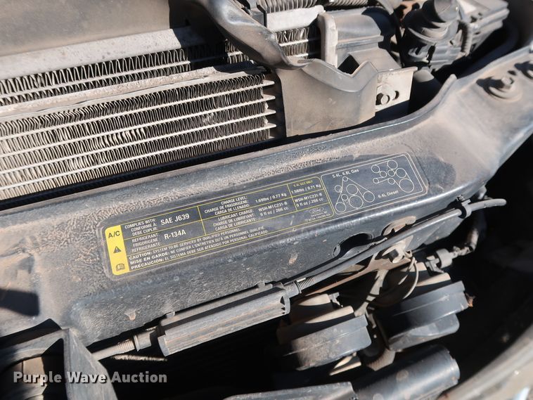 image for item GD9895 2010 Ford F350 Super Duty SuperCab utility bed pickup truck