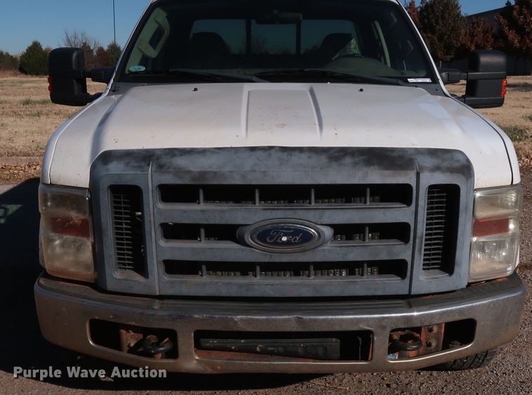 image for item GD9895 2010 Ford F350 Super Duty SuperCab utility bed pickup truck