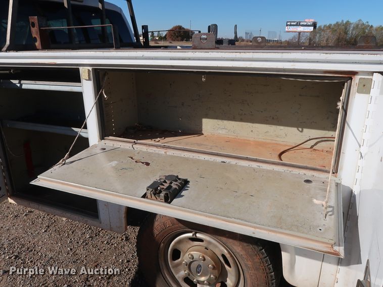 image for item GD9895 2010 Ford F350 Super Duty SuperCab utility bed pickup truck