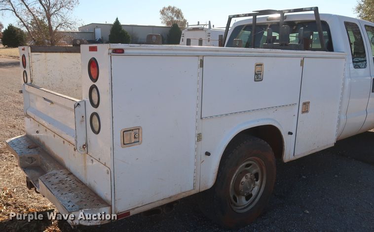 image for item GD9895 2010 Ford F350 Super Duty SuperCab utility bed pickup truck