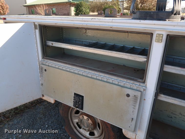 image for item GD9895 2010 Ford F350 Super Duty SuperCab utility bed pickup truck