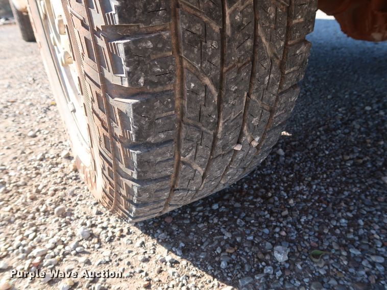 image for item GD9895 2010 Ford F350 Super Duty SuperCab utility bed pickup truck