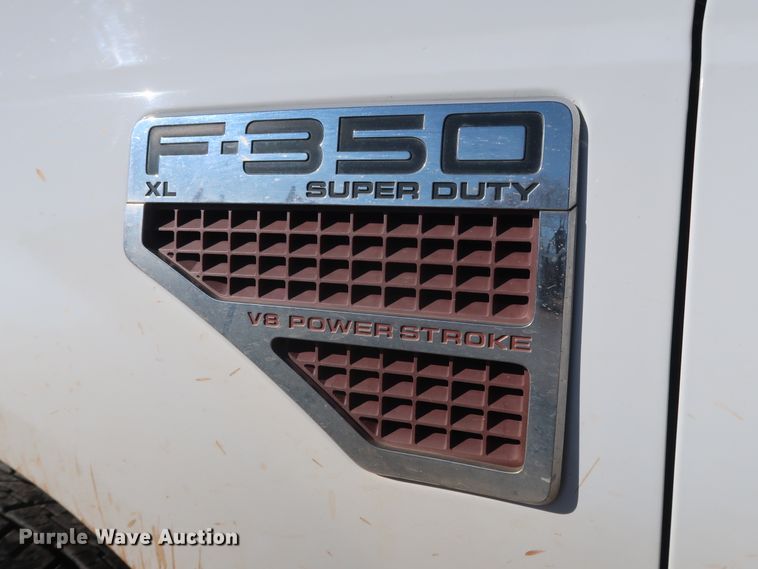 image for item GD9895 2010 Ford F350 Super Duty SuperCab utility bed pickup truck