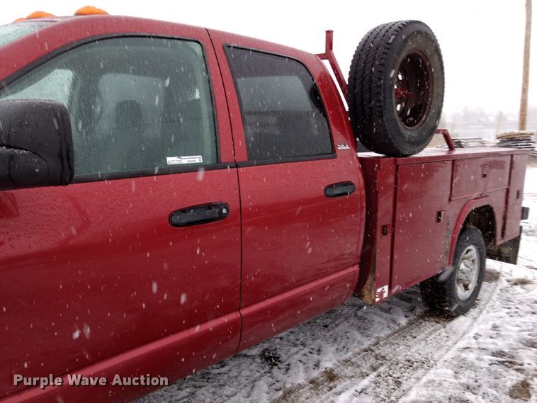 image for item GE9556 2007 Dodge Ram 3500 SLT Quad Cab utility bed pickup truck