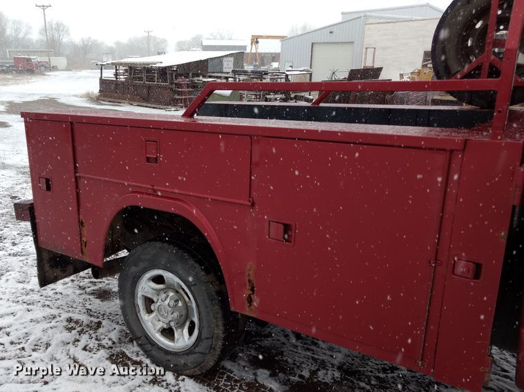 image for item GE9556 2007 Dodge Ram 3500 SLT Quad Cab utility bed pickup truck