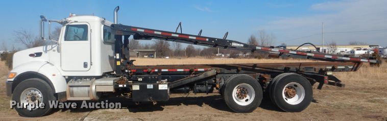 image for item GF9000 2006 Peterbilt 335 roll off container truck