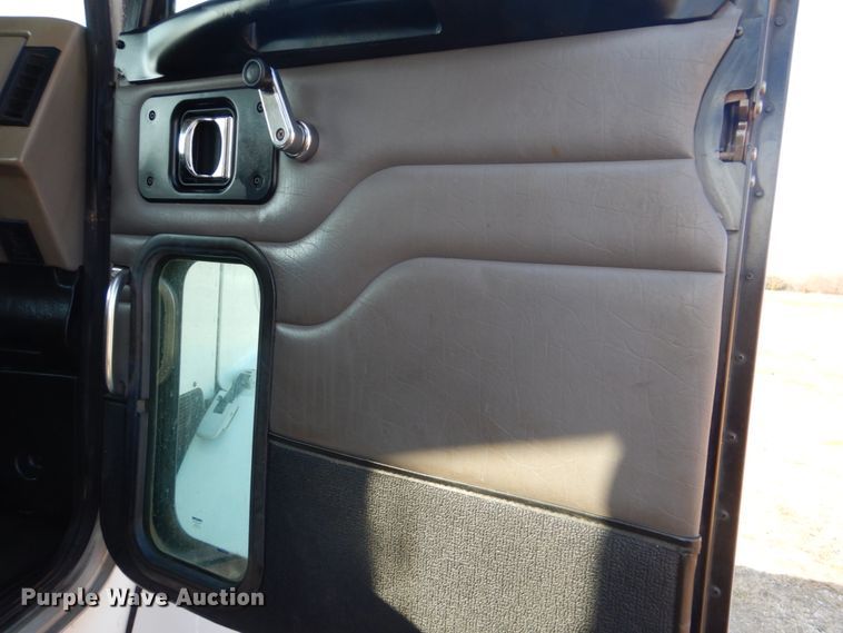 image for item GF9000 2006 Peterbilt 335 roll off container truck