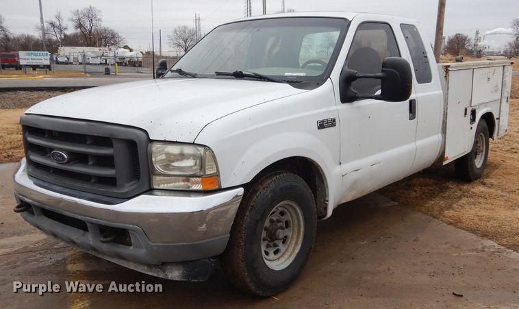 image for item GF9849 2001 Ford F250 Super Duty SuperCab utility bed pickup truck