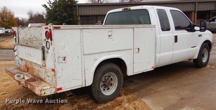 image for item GF9849 2001 Ford F250 Super Duty SuperCab utility bed pickup truck