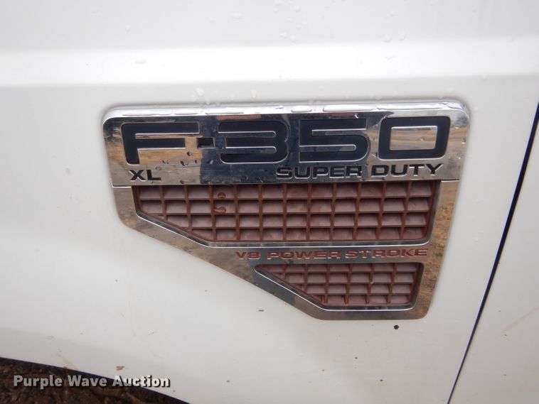 image for item GF9850 2010 Ford F350 XL Super Duty SuperCab utility bed pickup truck