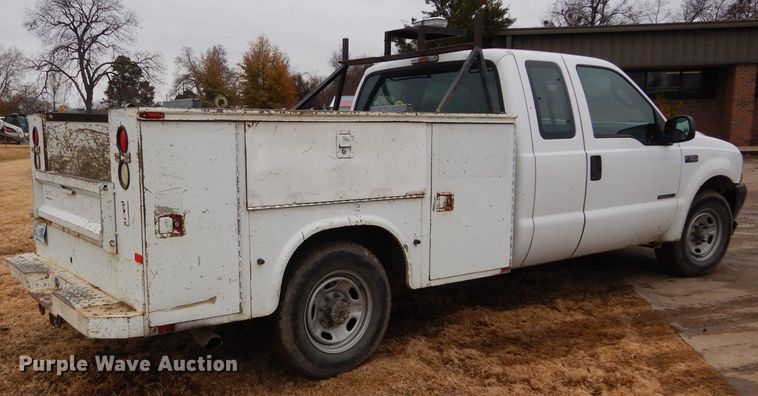 image for item GF9853 2003 Ford F250 Super Duty SuperCab utility bed pickup truck