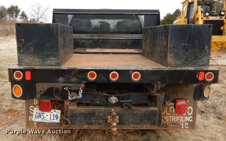 image for item GF9919 2012 Ford F350 Super Duty Crew Cab flatbed pickup truck