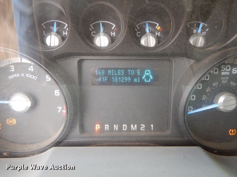 image for item GF9919 2012 Ford F350 Super Duty Crew Cab flatbed pickup truck