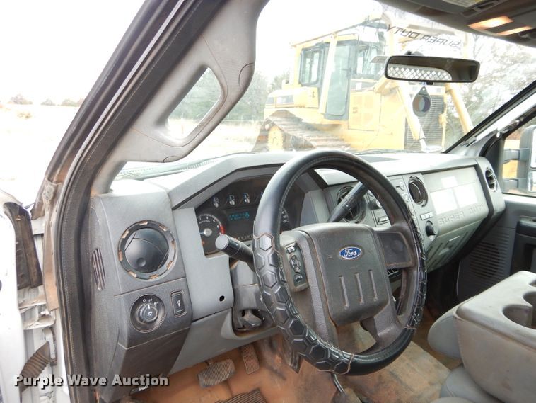 image for item GF9919 2012 Ford F350 Super Duty Crew Cab flatbed pickup truck