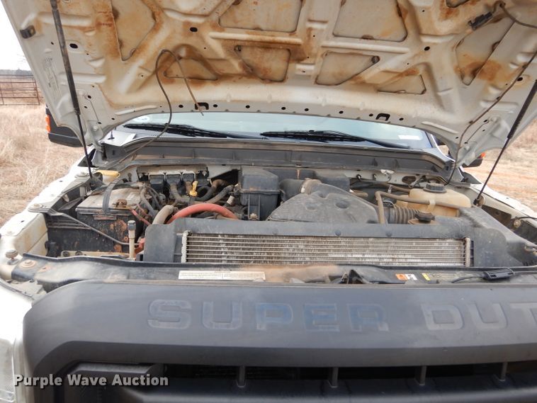 image for item GF9919 2012 Ford F350 Super Duty Crew Cab flatbed pickup truck