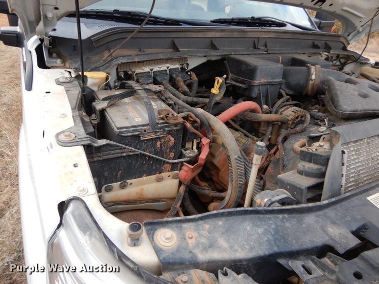 image for item GF9919 2012 Ford F350 Super Duty Crew Cab flatbed pickup truck