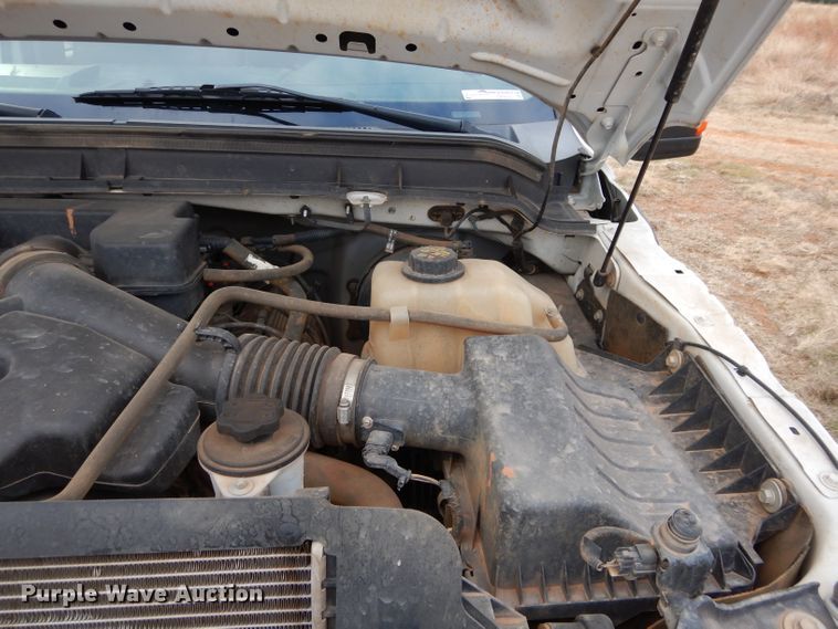 image for item GF9919 2012 Ford F350 Super Duty Crew Cab flatbed pickup truck