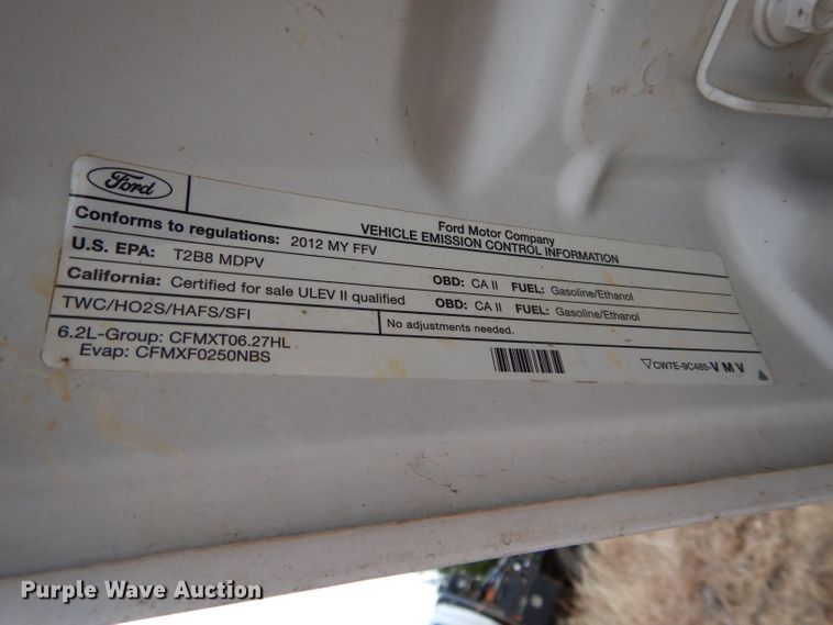 image for item GF9919 2012 Ford F350 Super Duty Crew Cab flatbed pickup truck