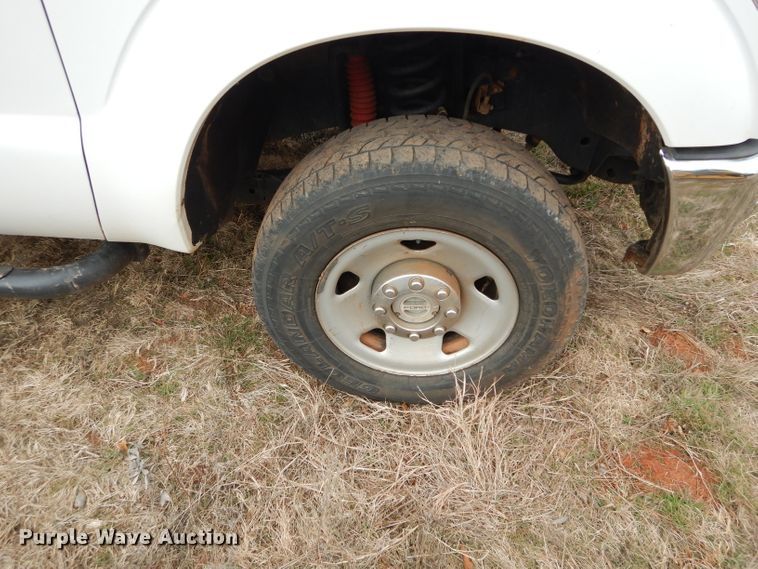 image for item GF9919 2012 Ford F350 Super Duty Crew Cab flatbed pickup truck