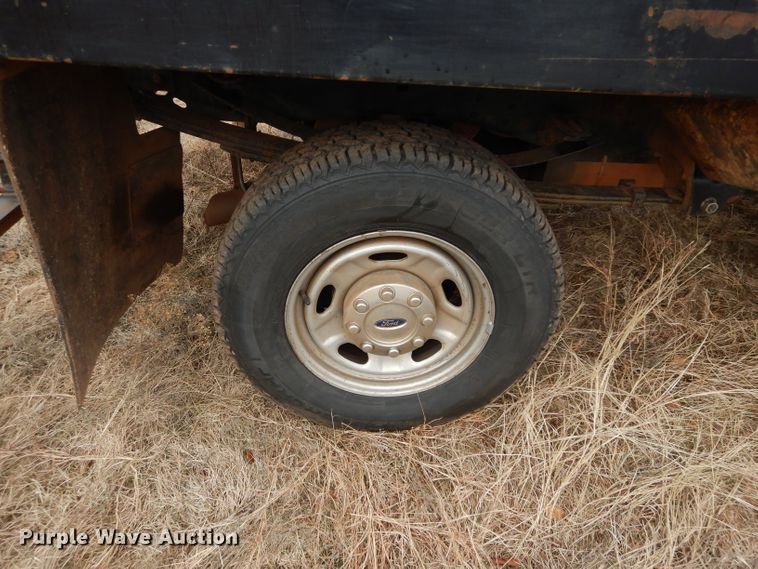 image for item GF9919 2012 Ford F350 Super Duty Crew Cab flatbed pickup truck