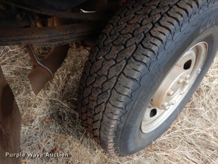 image for item GF9919 2012 Ford F350 Super Duty Crew Cab flatbed pickup truck