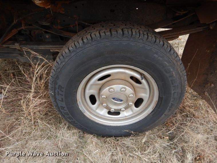 image for item GF9919 2012 Ford F350 Super Duty Crew Cab flatbed pickup truck