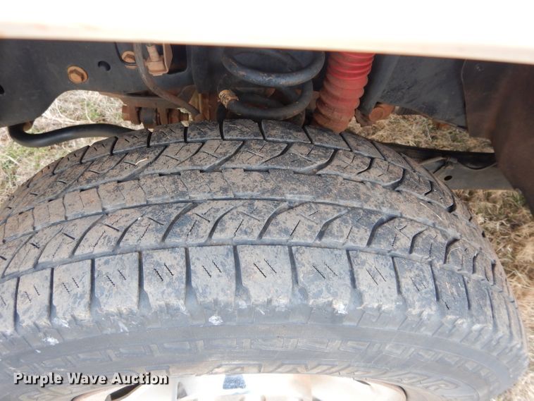 image for item GF9919 2012 Ford F350 Super Duty Crew Cab flatbed pickup truck