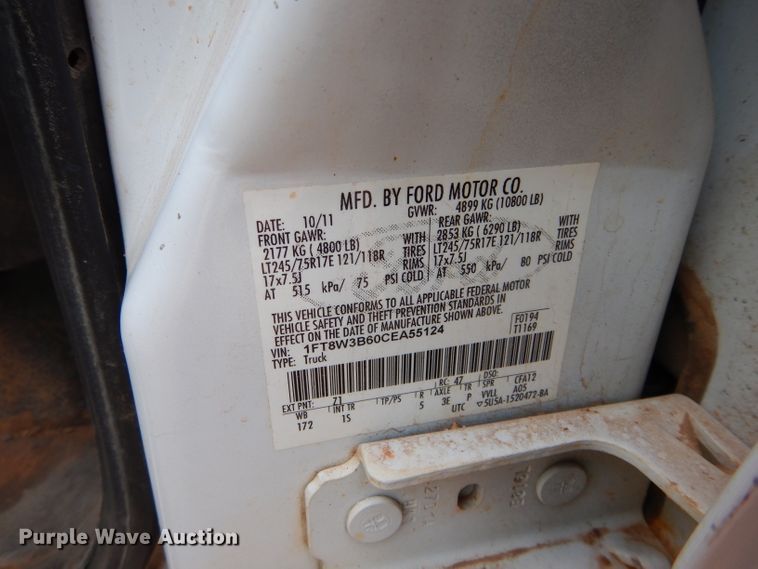 image for item GF9919 2012 Ford F350 Super Duty Crew Cab flatbed pickup truck