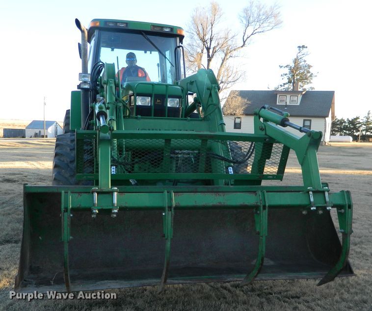 image for item DE4370 2001 John Deere 7610 MFWD tractor