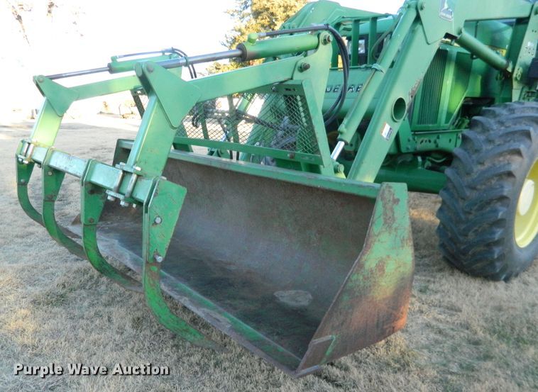 image for item DE4370 2001 John Deere 7610 MFWD tractor